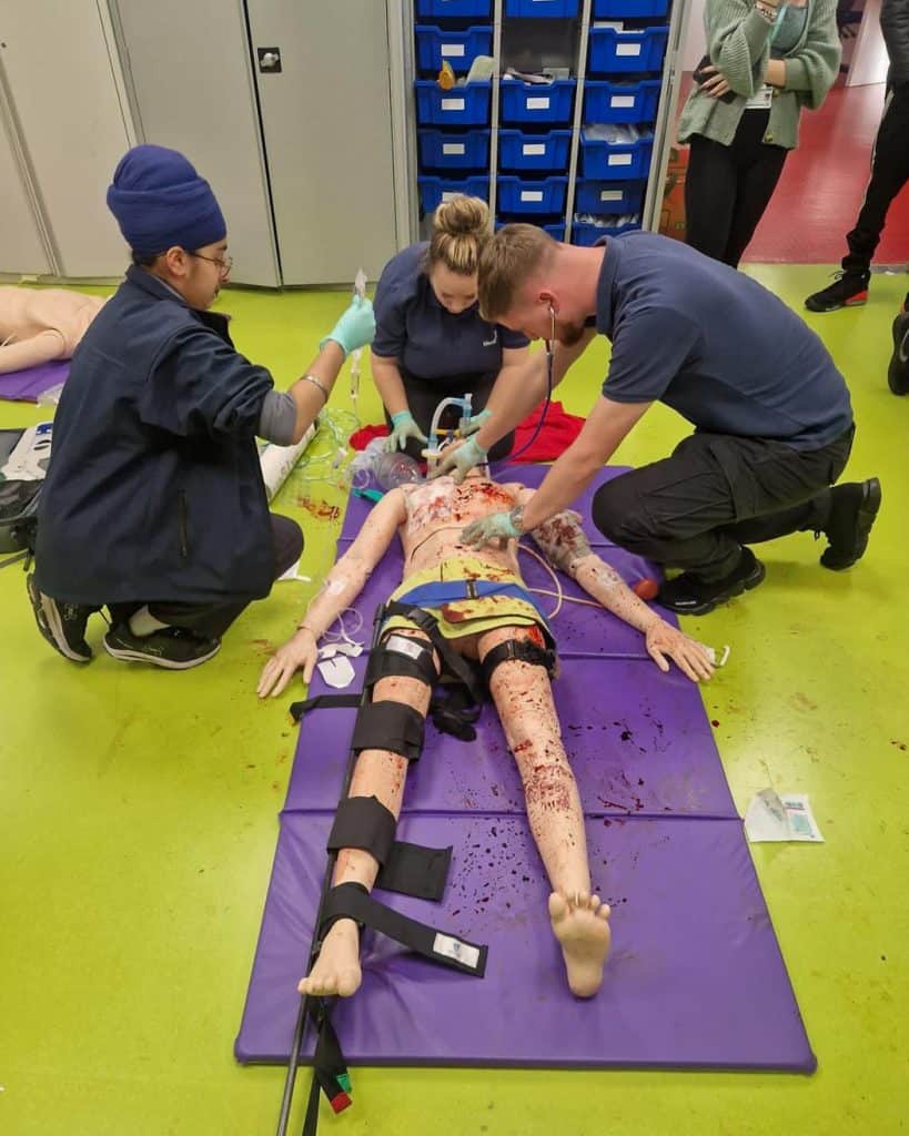 Trauma practice on a manikin being carried out by our London tutors.