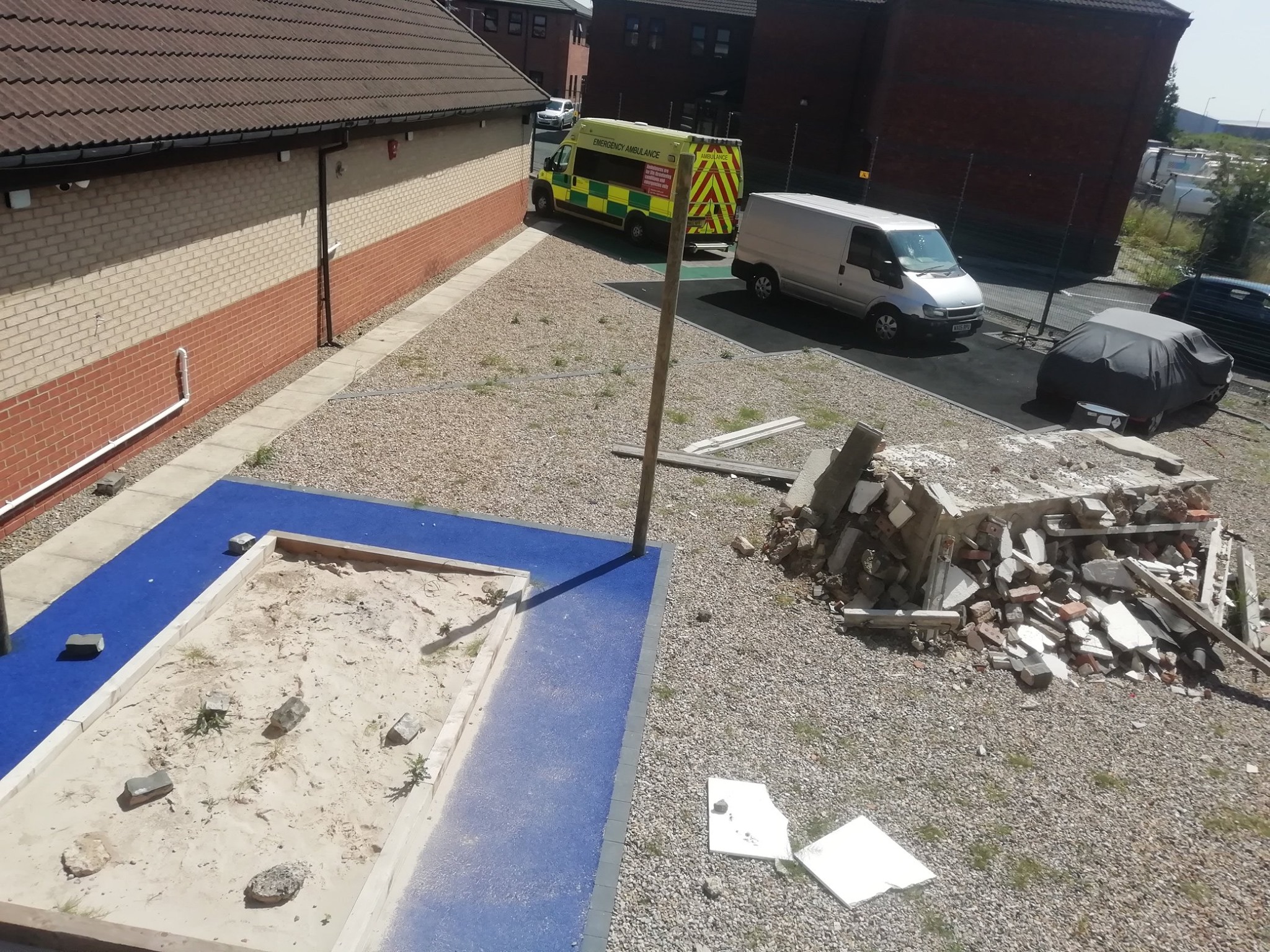 Sand pit and rubble simulation area with Medipro ambulance at Faraday House