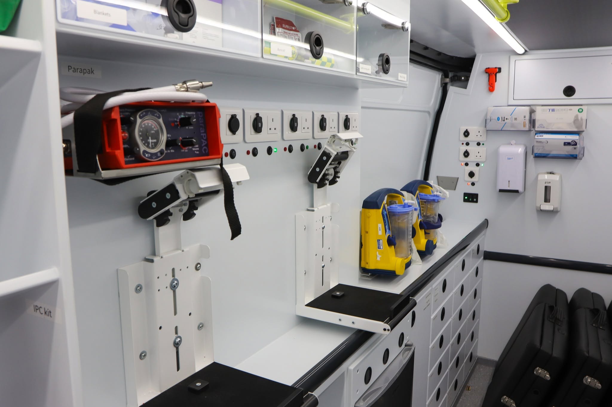 Inside a Medipro mobile education unit: mounted ventilator, suction unit and clinical equipment storage